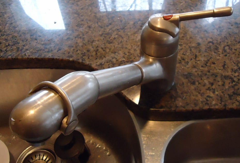 Kitchen faucet and sink, representative fixture photograph